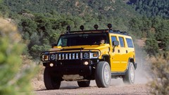 Yellow vehicles Hummer H2