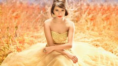 Yellow woman dress earrings golden blue eyes brunettes models 