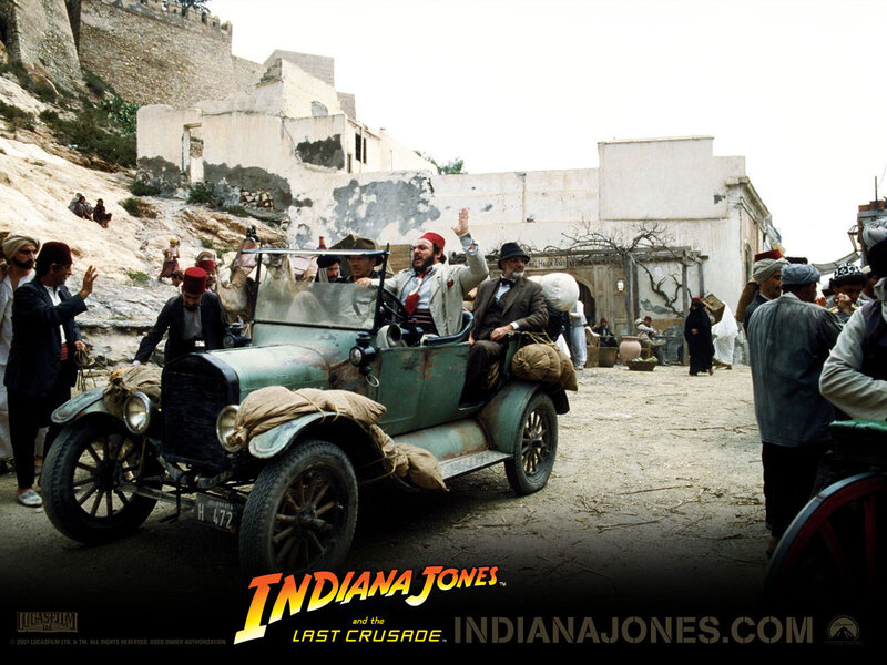 Indiana Jones in a vintage car