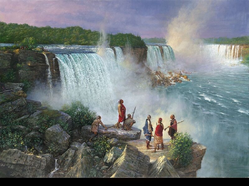 Indigenous people at a waterfall