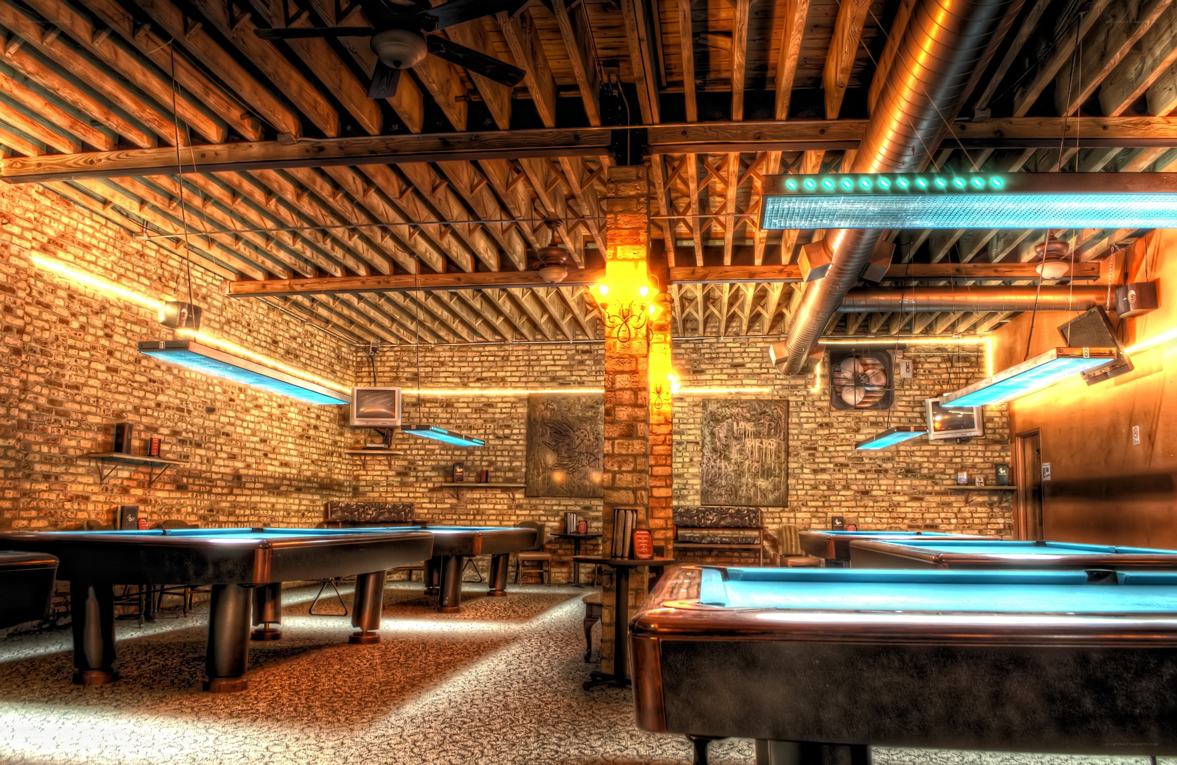 indoor pool hall with brick walls