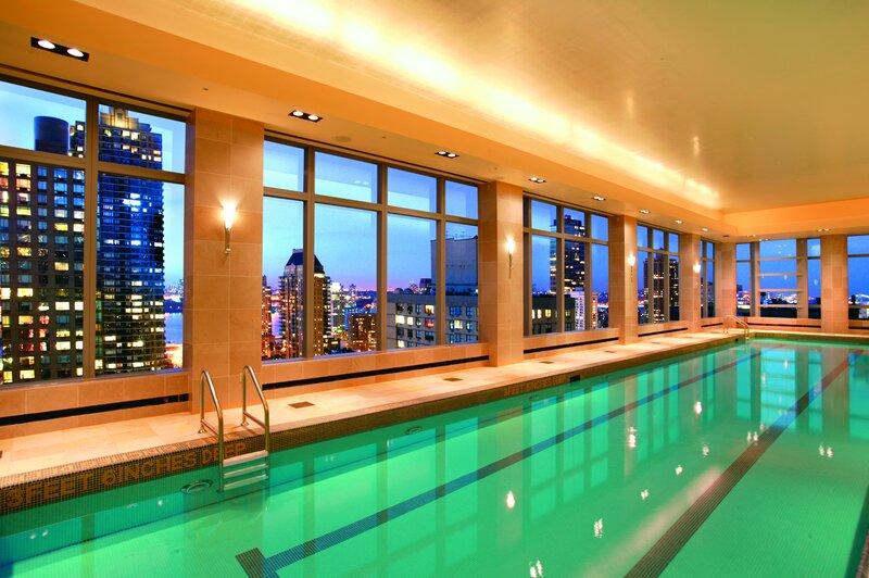 Indoor pool with city view
