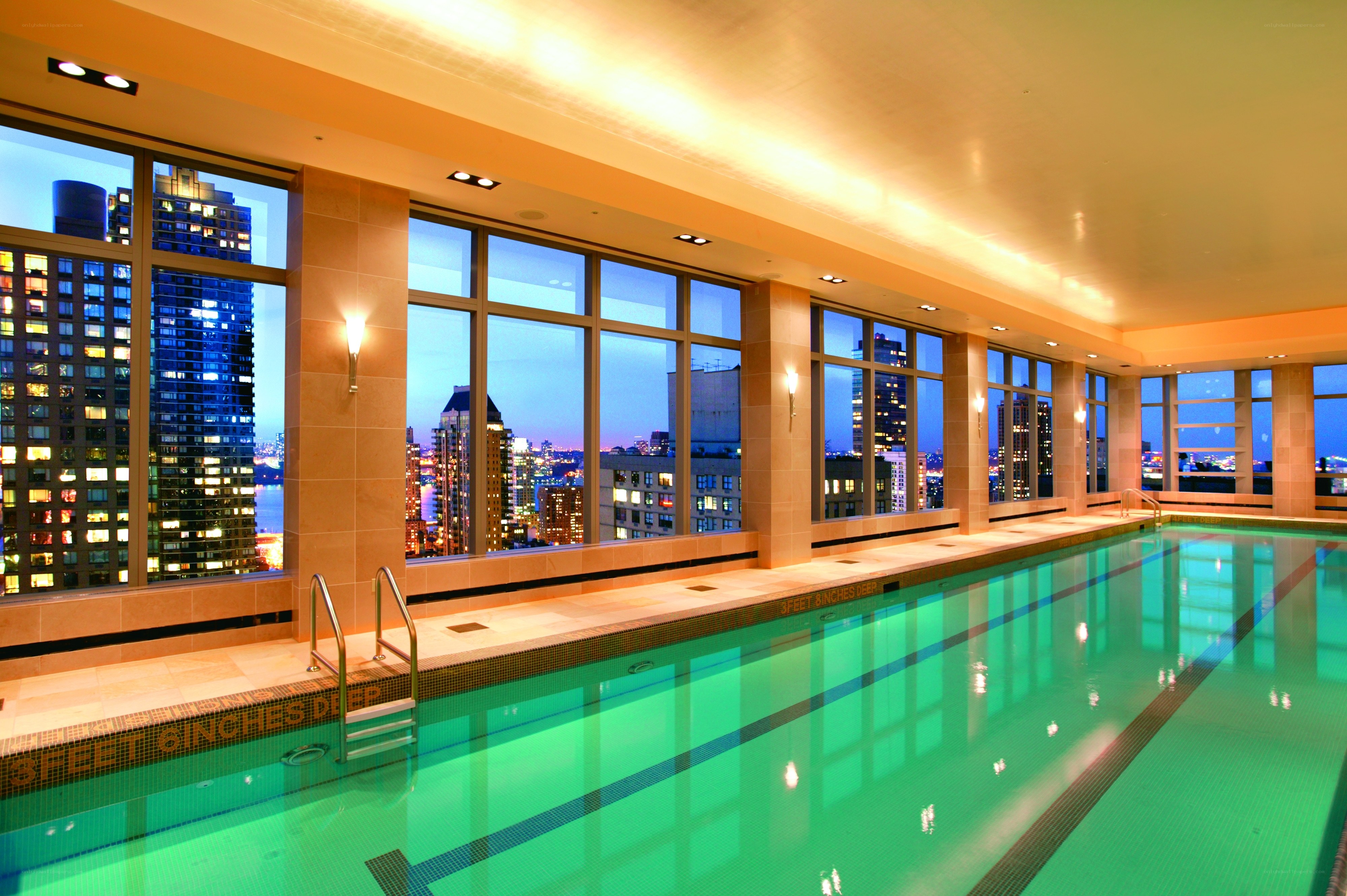 Indoor pool with city view