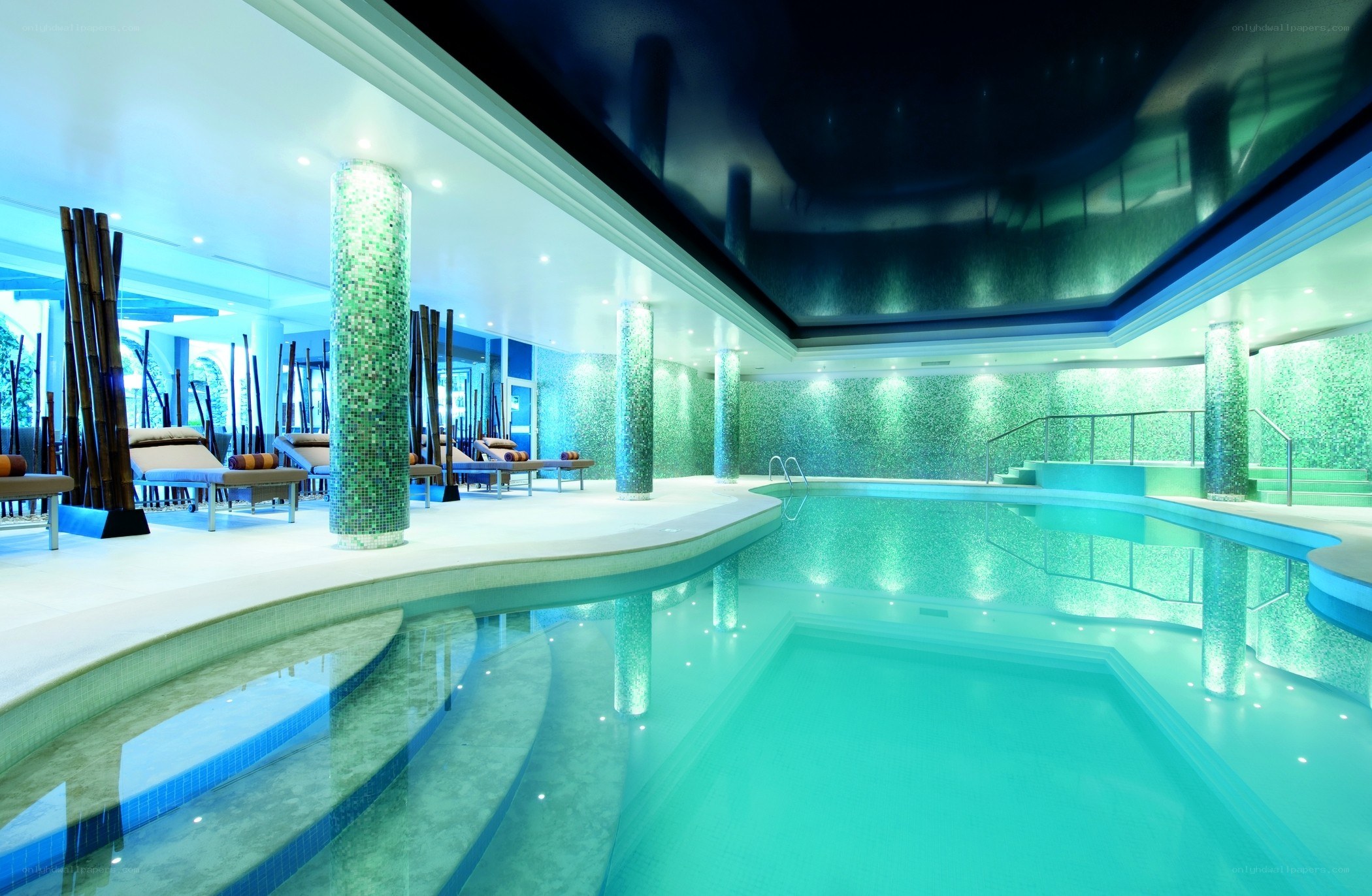 indoor pool with green mosaic