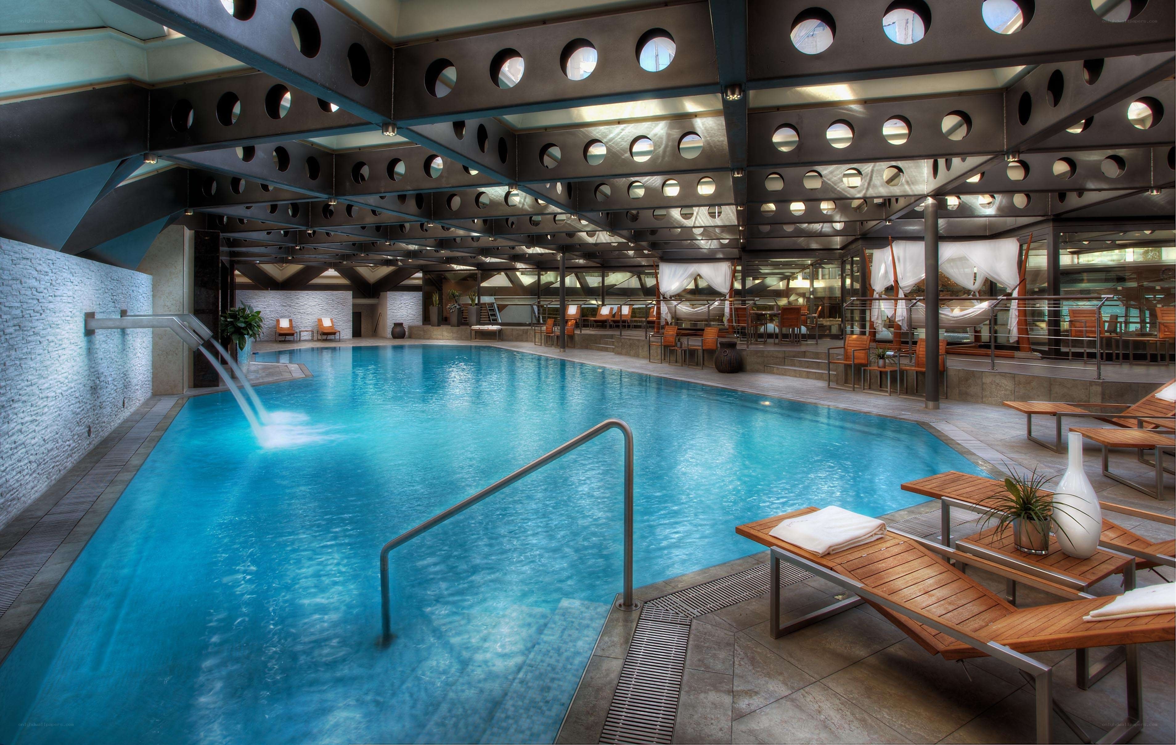 indoor pool with lounge area