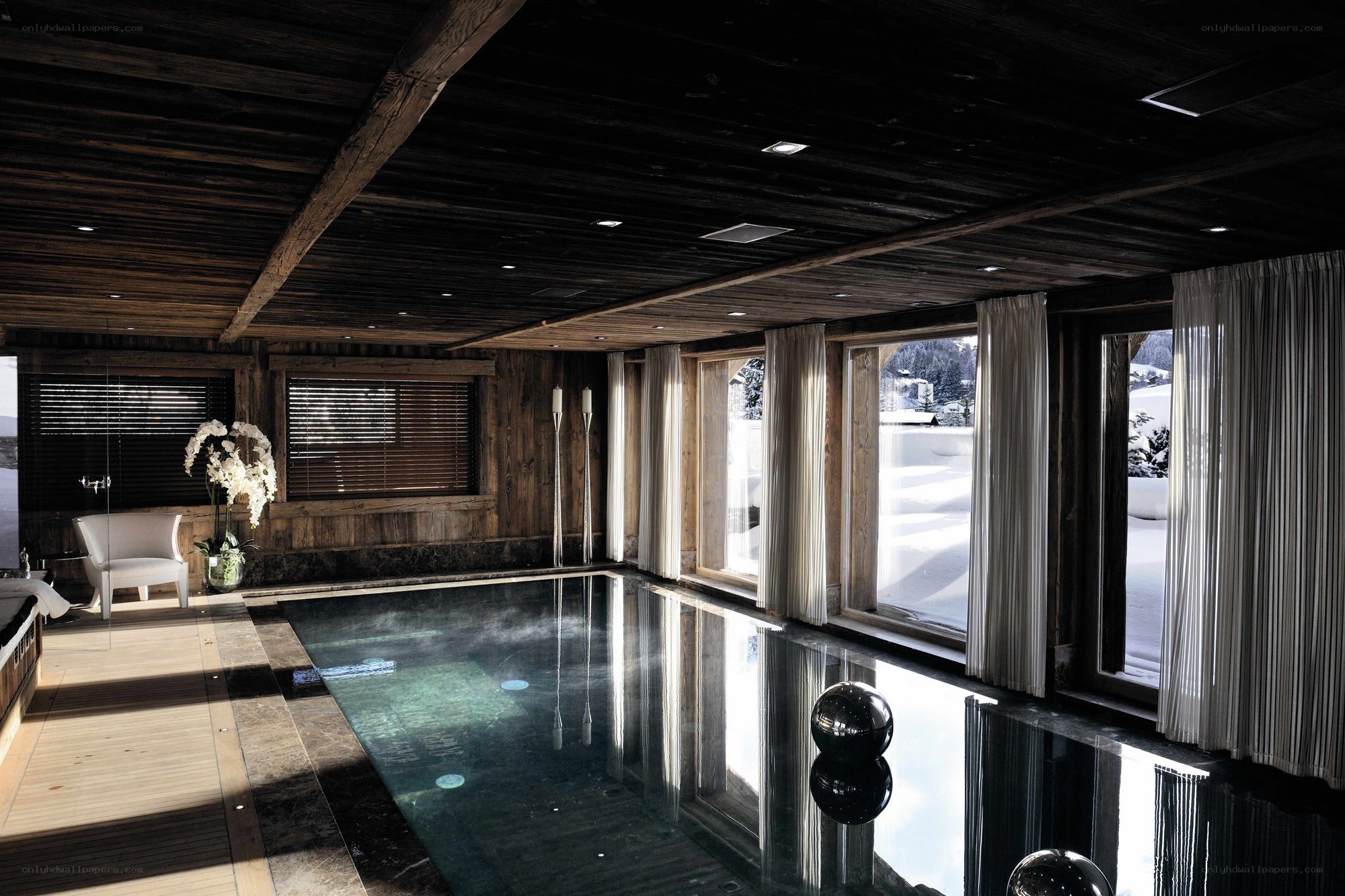indoor pool with mountain view