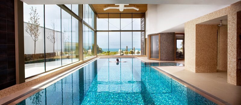 Indoor pool with ocean view