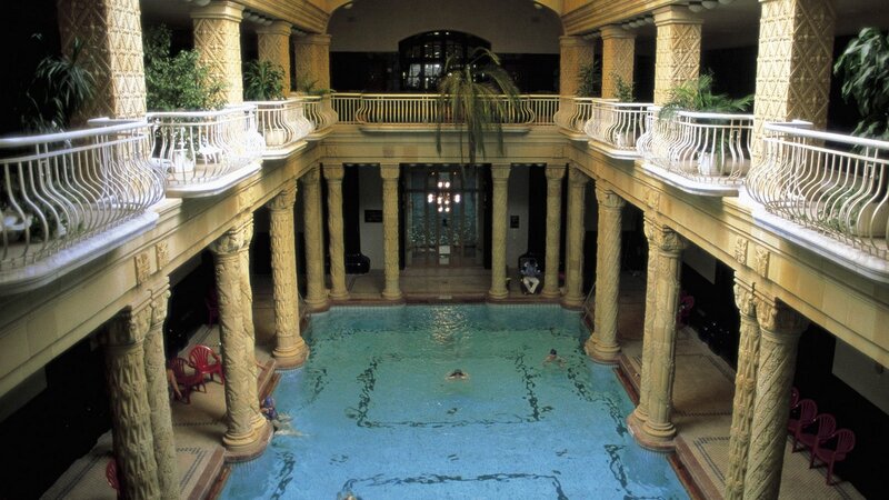indoor pool with ornate columns