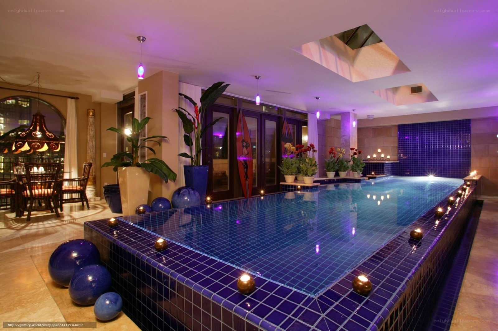 indoor pool with purple lighting