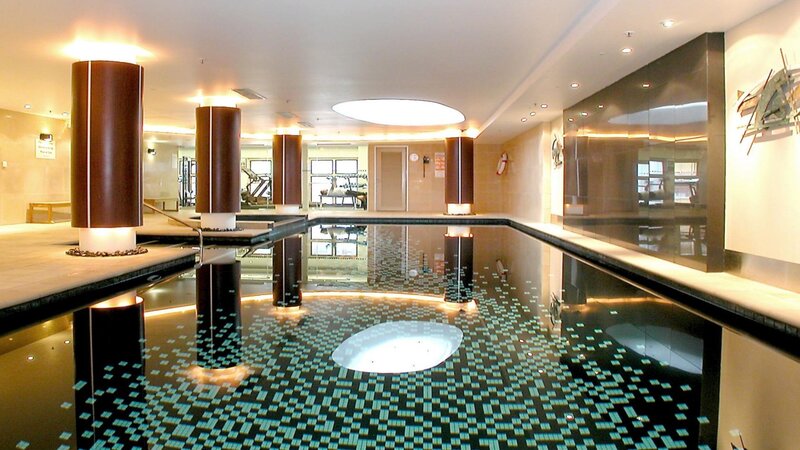 indoor pool with spa area