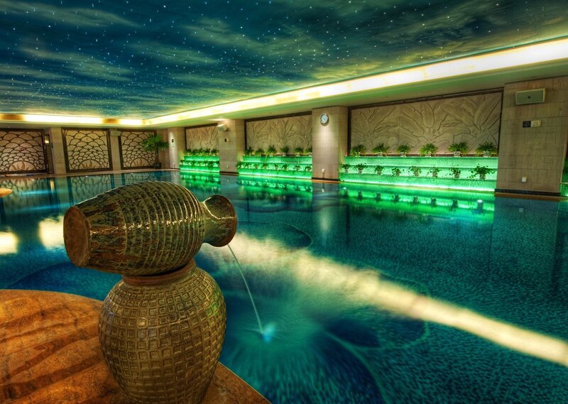 indoor pool with starry ceiling