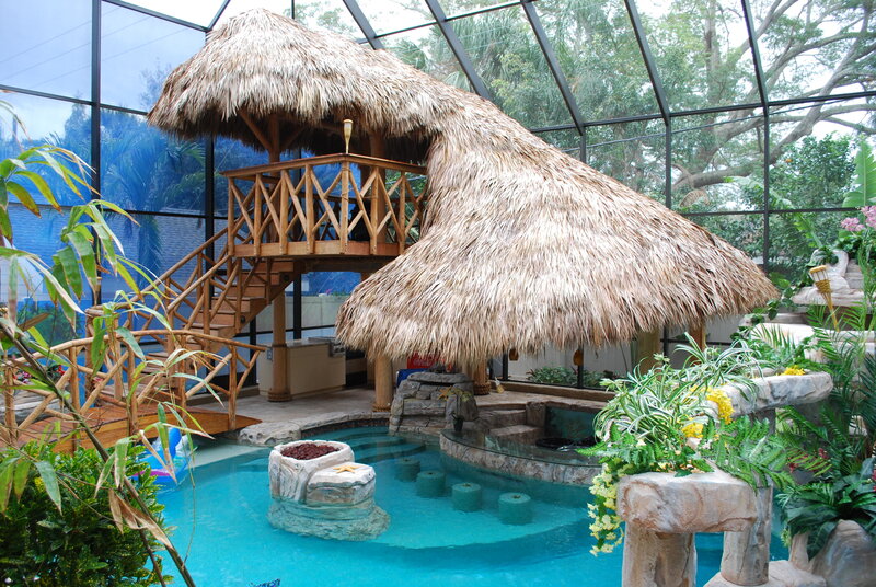 Indoor pool with tiki hut