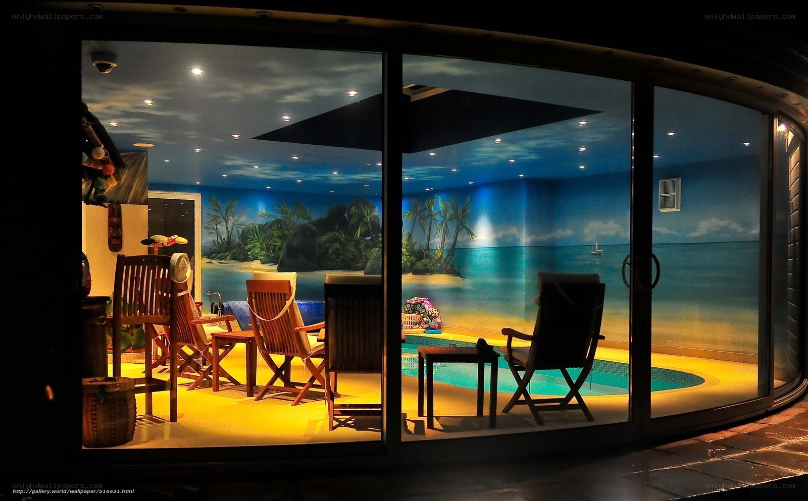 Indoor pool with tropical mural