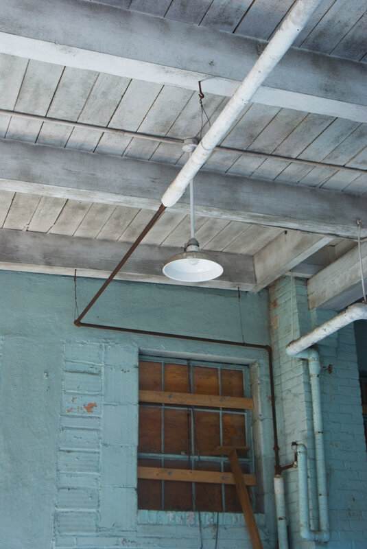 industrial ceiling with light fixture