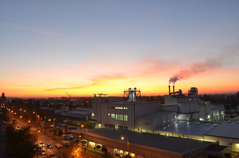 Industrial Complex at Dusk — Orange