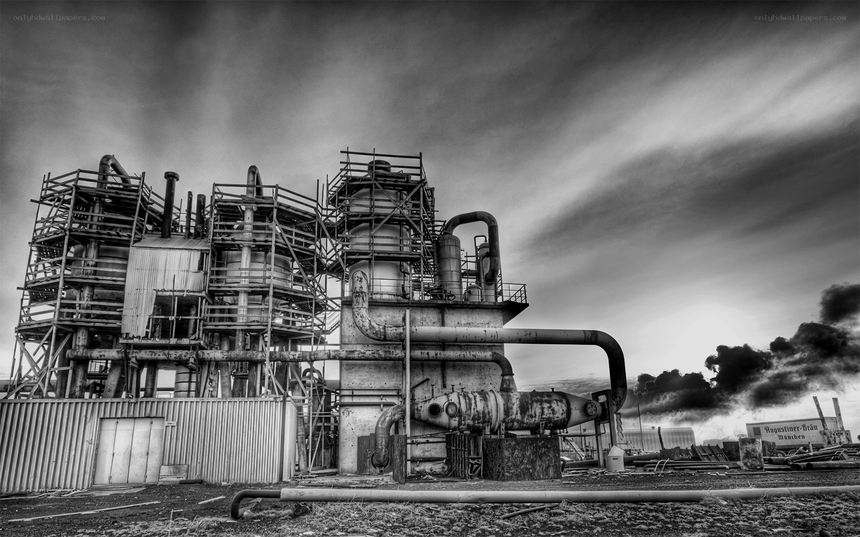 Industrial complex under stormy sky