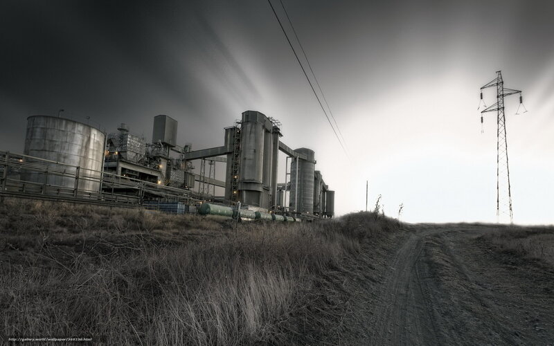 Industrial complex under stormy sky