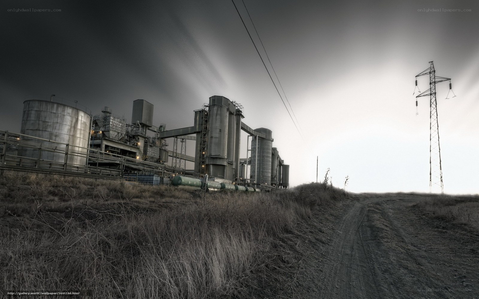 Industrial complex under stormy sky