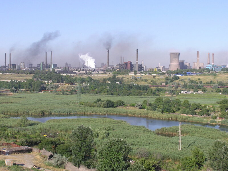 Industrial complex with river and marsh
