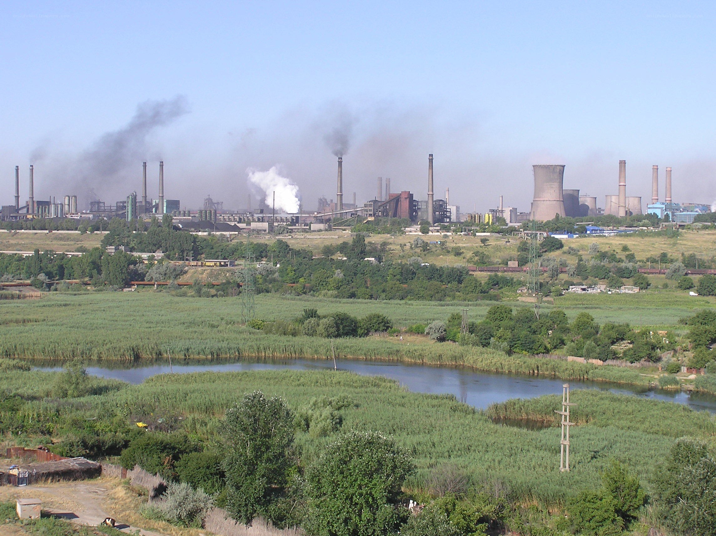 Industrial complex with river and marsh