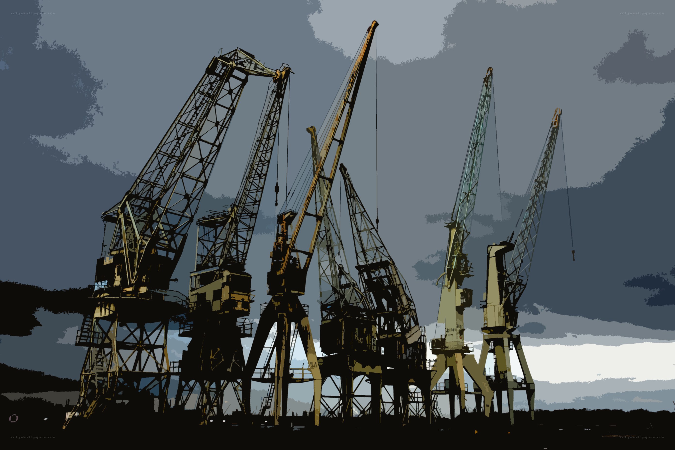 industrial cranes at dusk