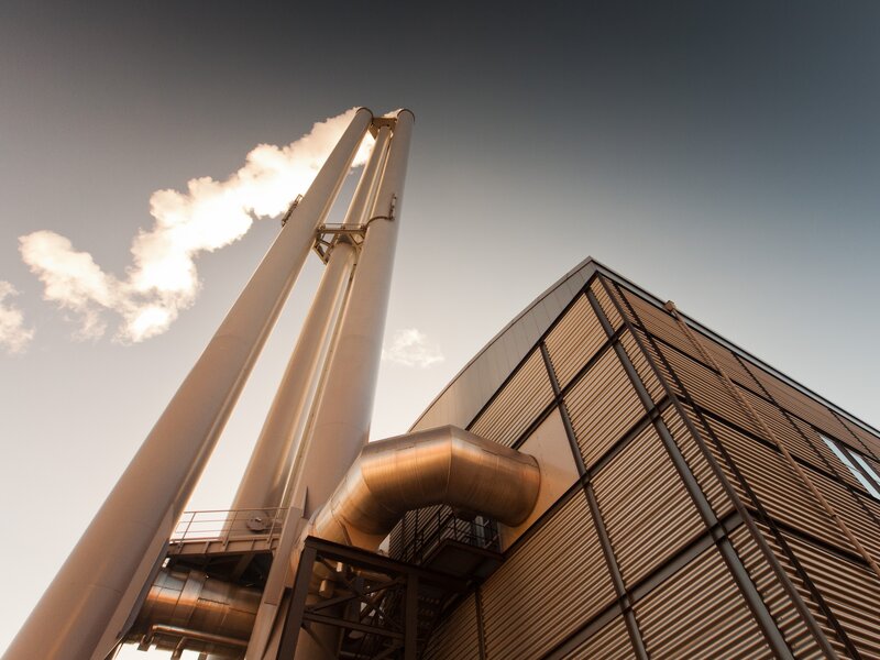 Industrial facility with smokestacks