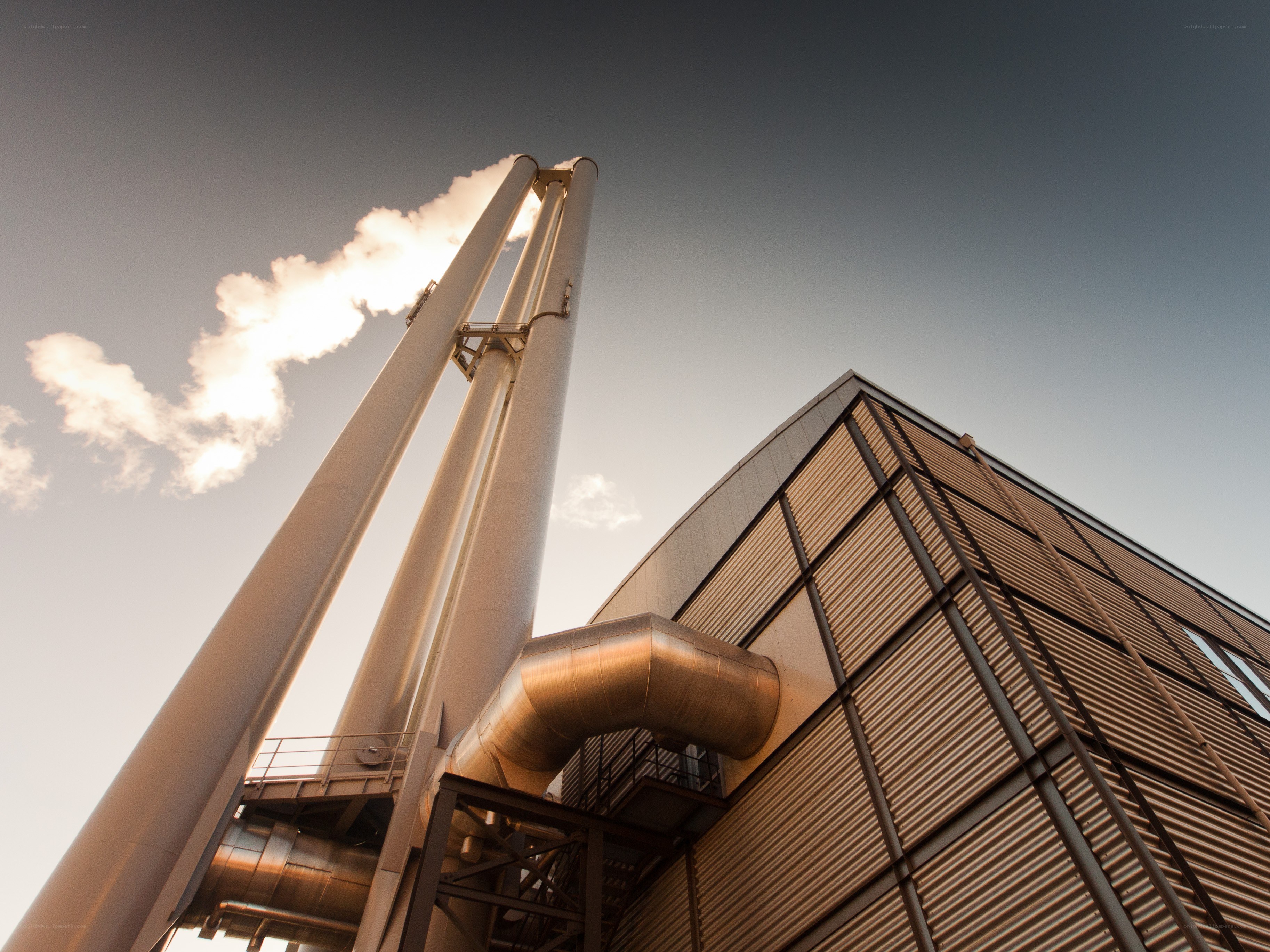 Industrial facility with smokestacks