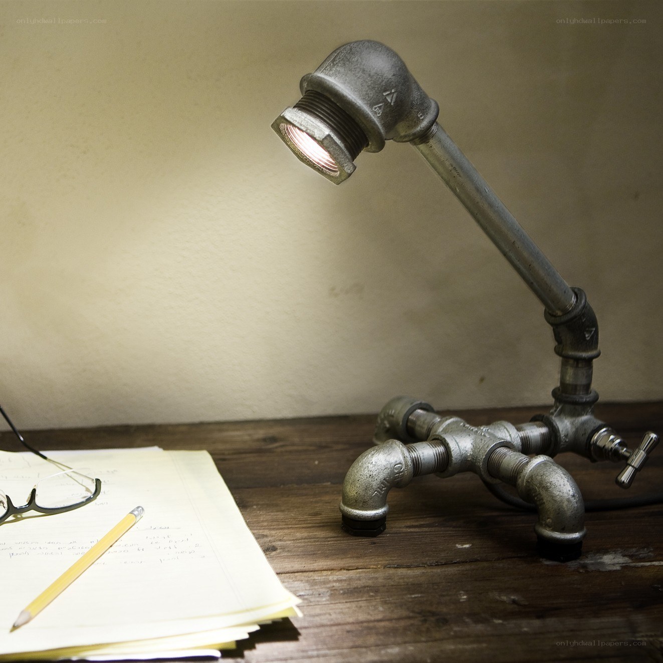 industrial pipe lamp on desk
