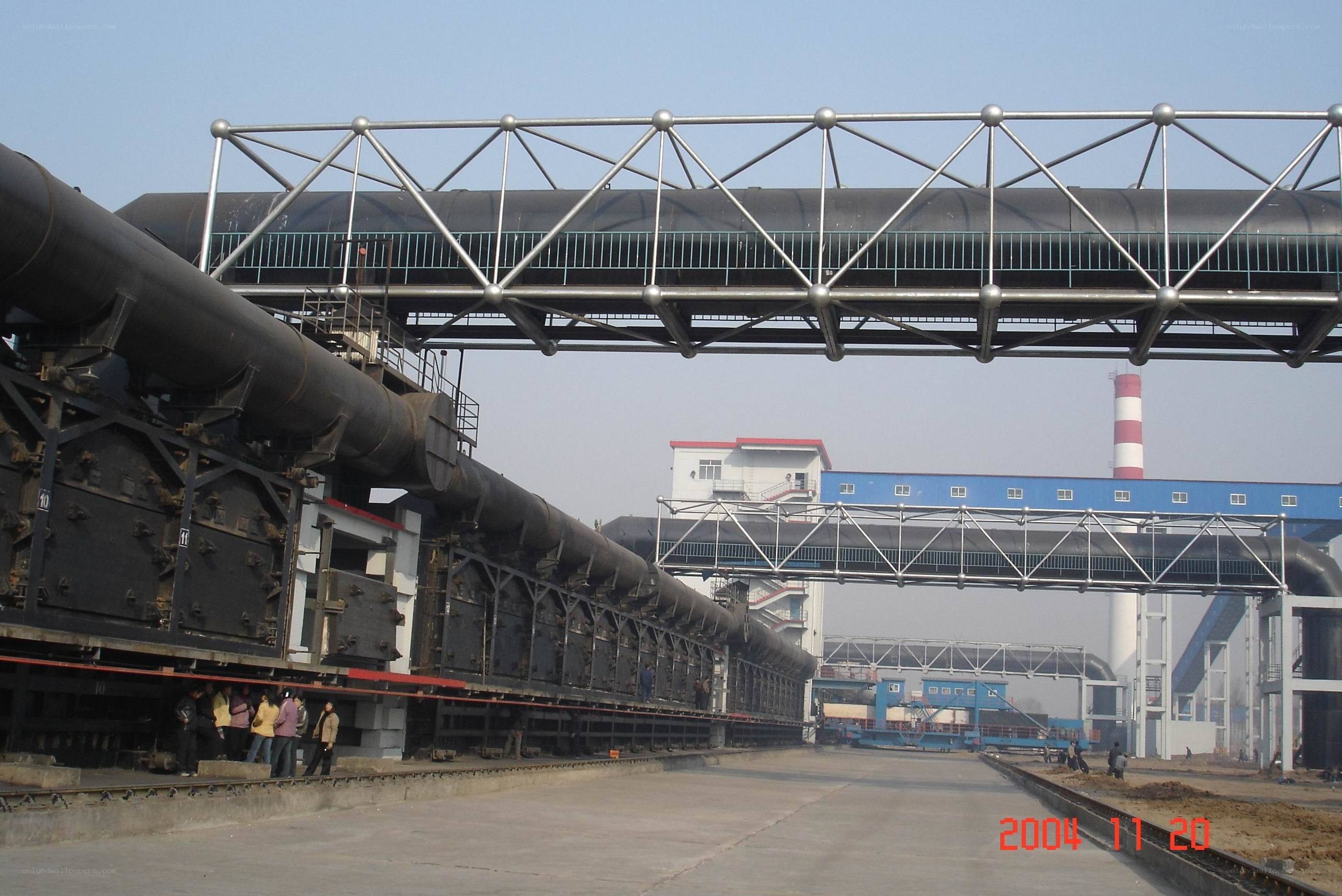 Industrial plant with conveyor system