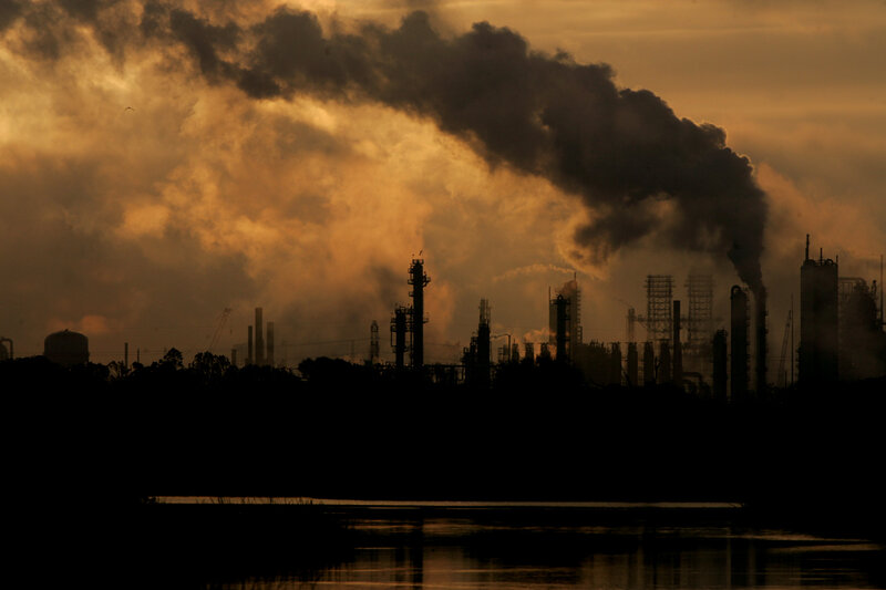 Industrial pollution at sunset
