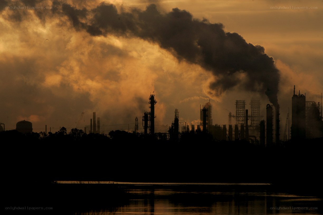 Industrial pollution at sunset