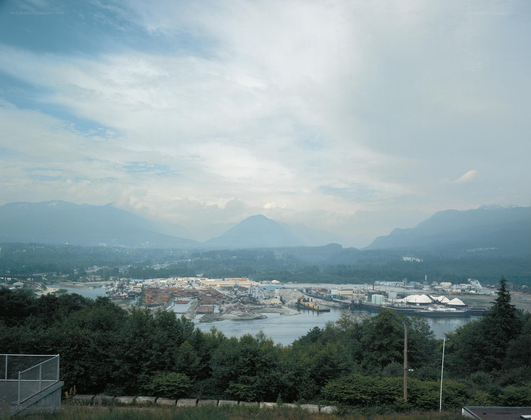industrial port with mountains