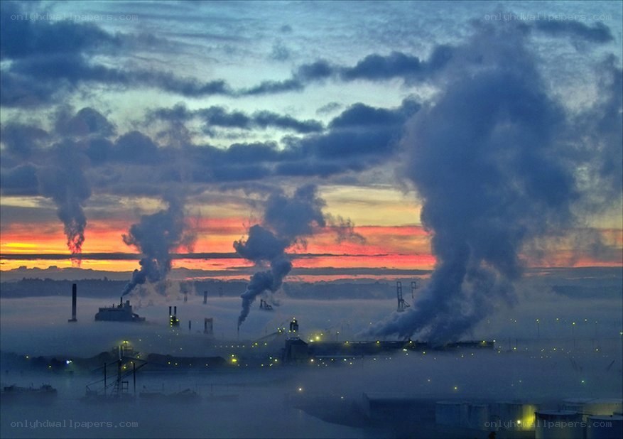 Industrial smoke at sunset