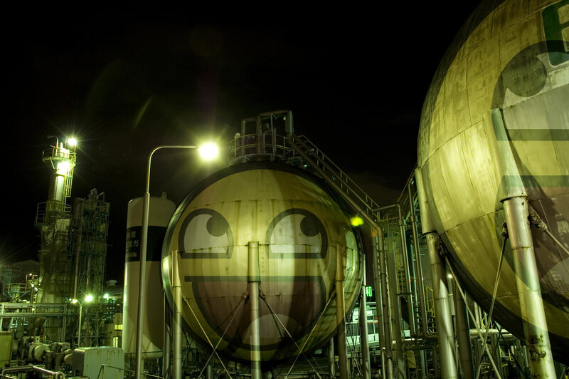 industrial tanks with smiley face