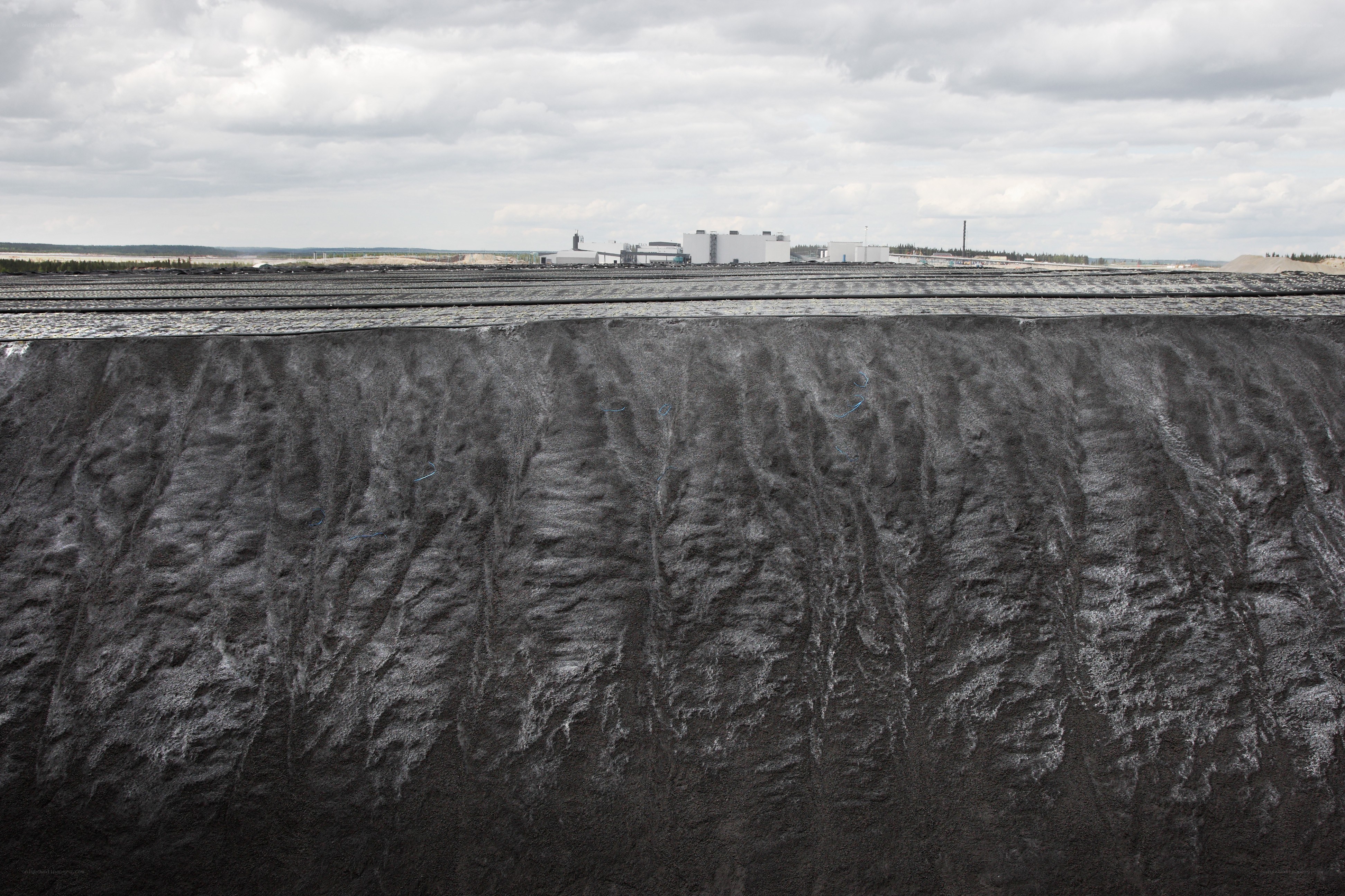 Industrial waste site with large mound
