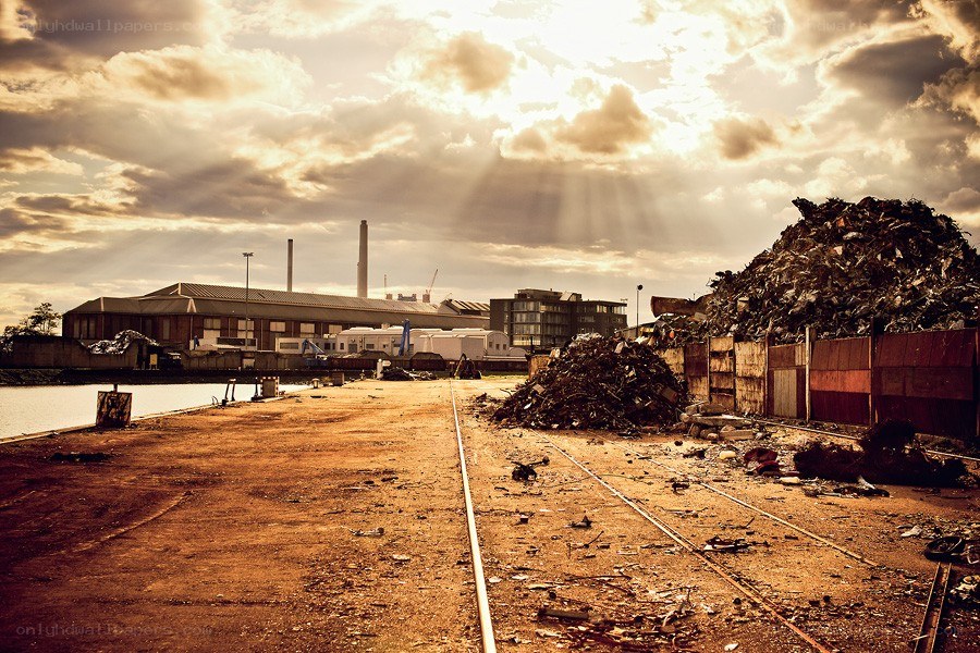 Industrial waste yard at sunset