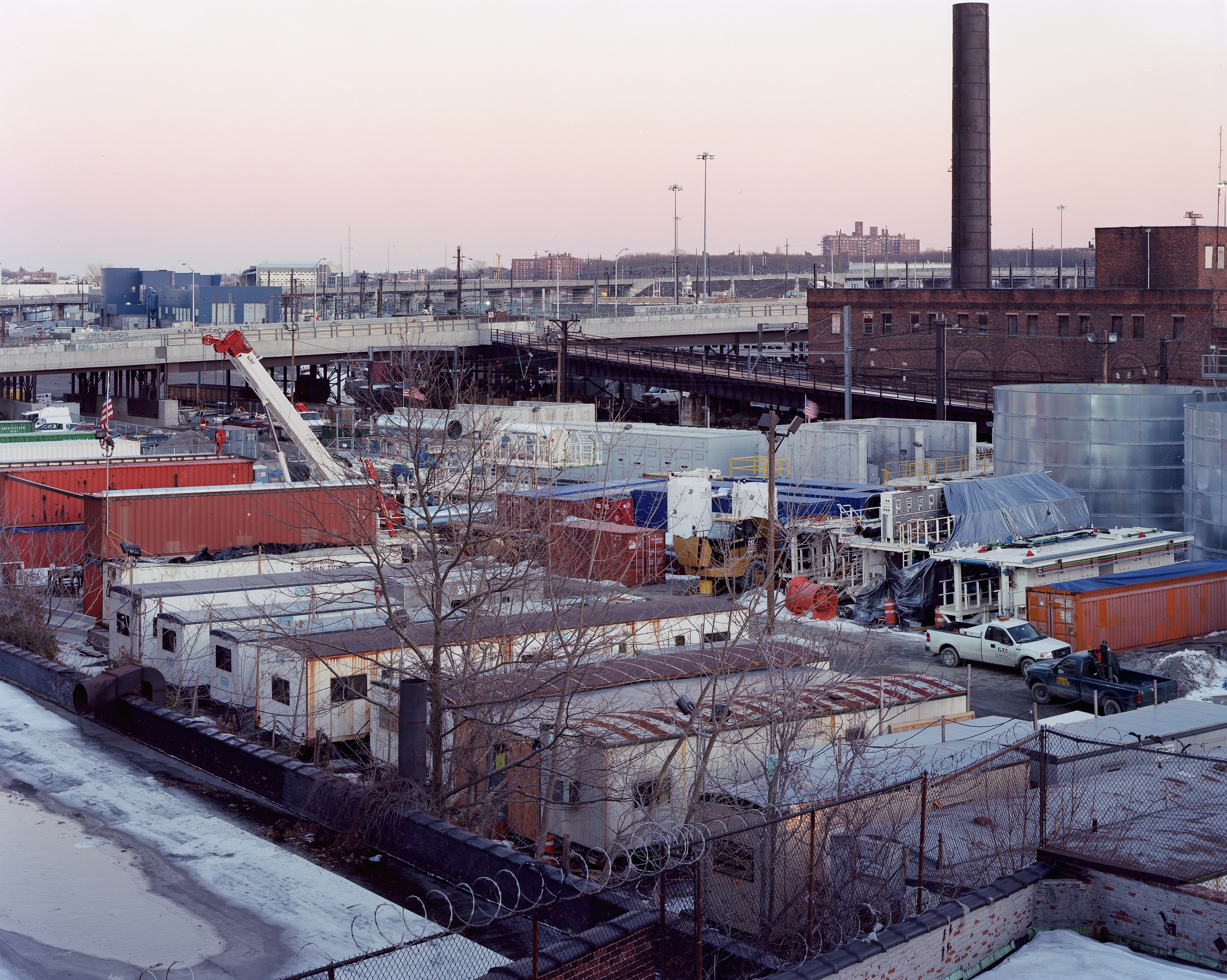 Industrial yard with cranes and containers