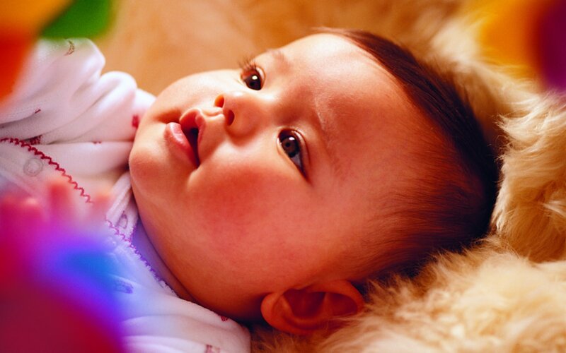 Infant Lying on Blanket — White, Calm