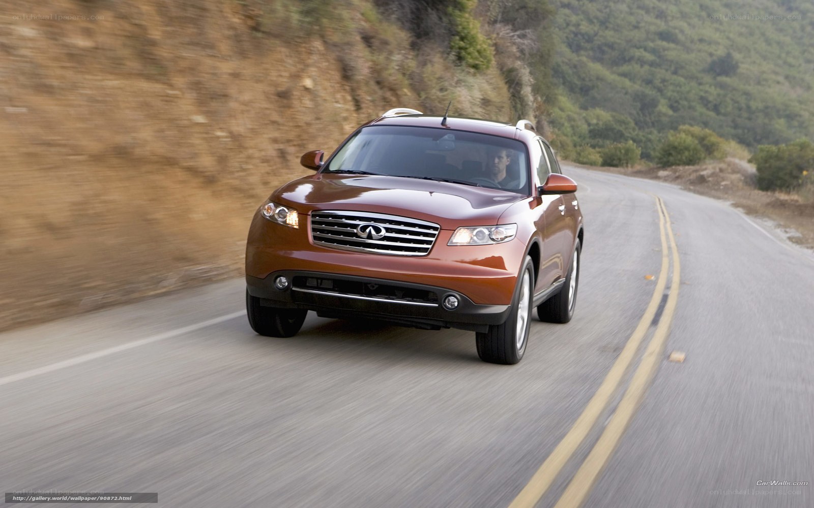 Infiniti FX driving on a road