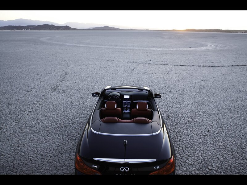 Infiniti G37 convertible on dry lake