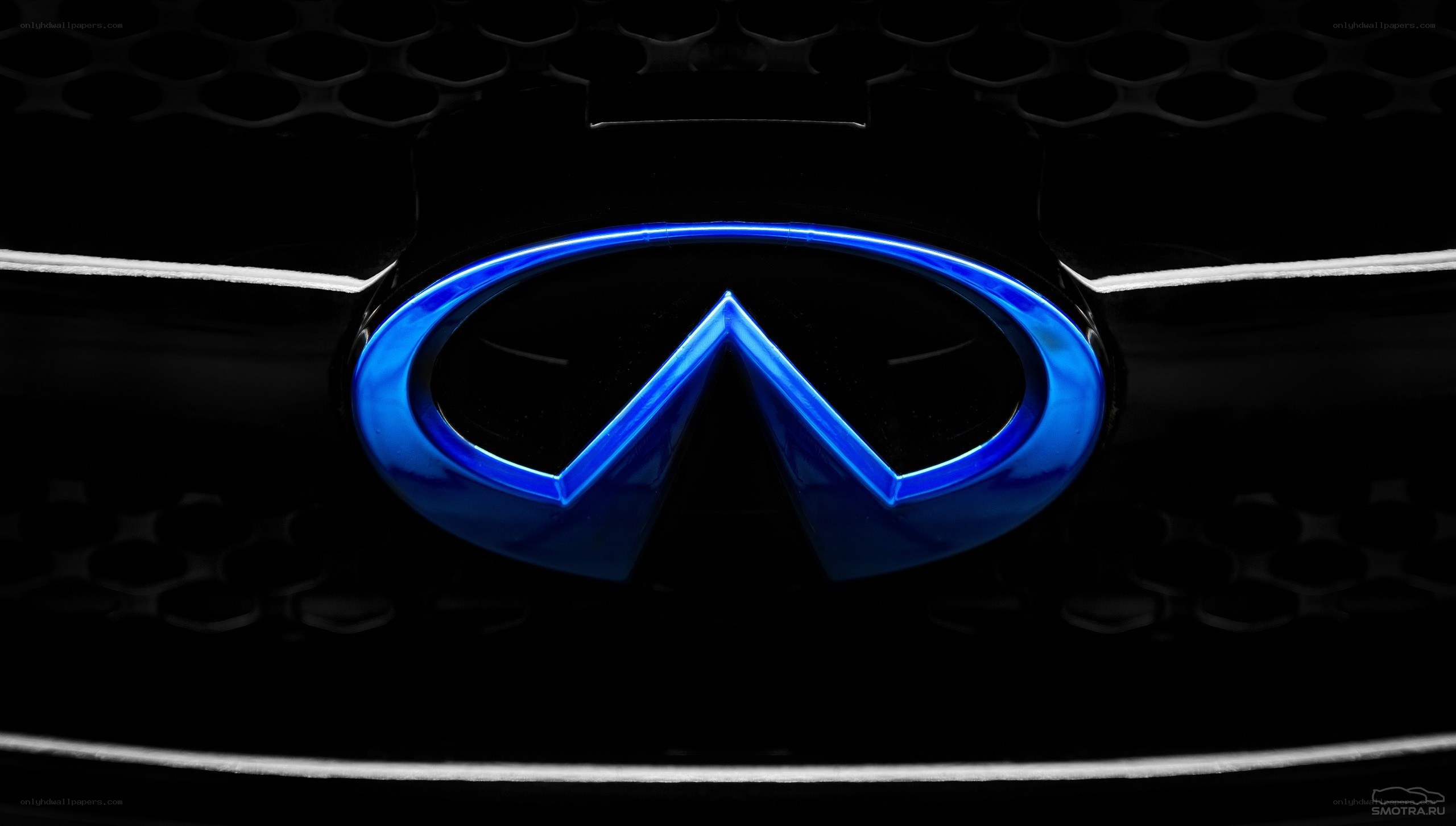 Infiniti logo on car grille