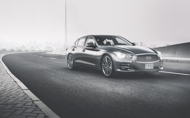Infiniti Q50 on a city road