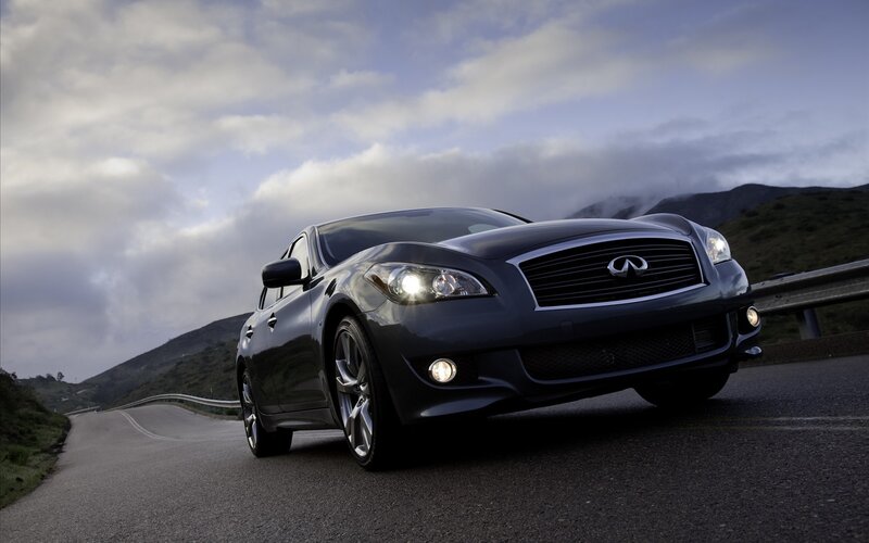 Infiniti sedan on winding road