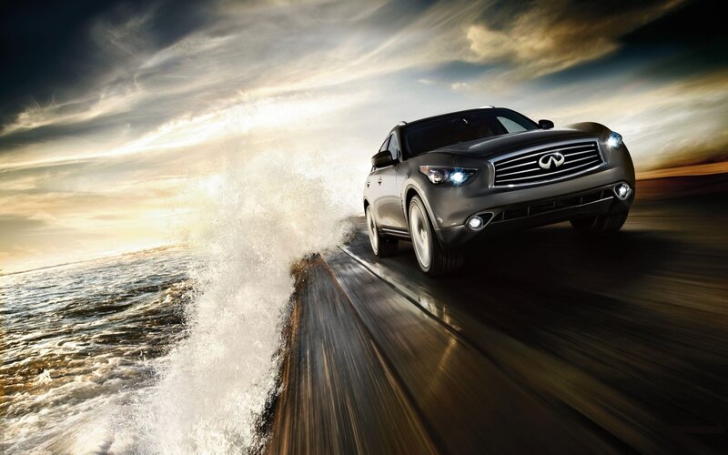 Infiniti SUV on coastal road