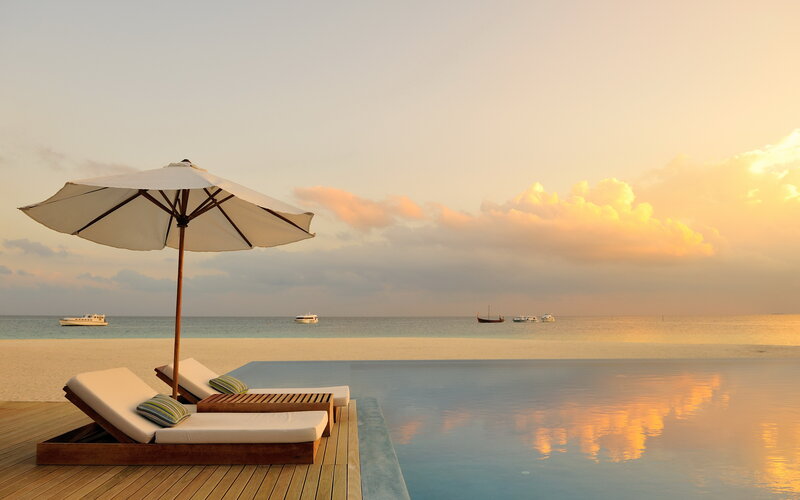 Infinity Pool at Beach — Blue, Serene, Sunset