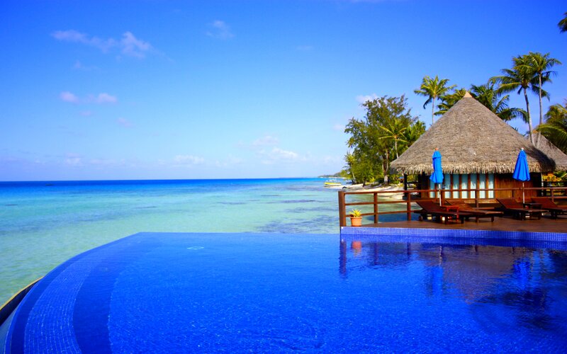 Infinity Pool at Beach Resort — Blue, Serene, Afternoon