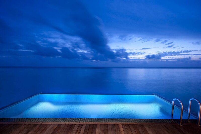 Infinity Pool at Dusk — Blue, Serene, Night, Photograph, Ocean