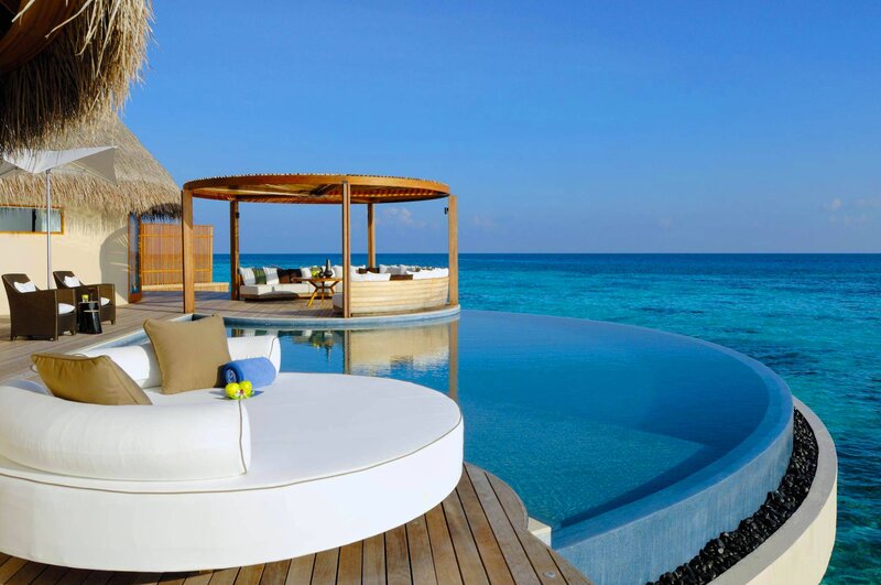 Infinity Pool at Resort — Blue, Serene, Afternoon, Photograph, Ocean