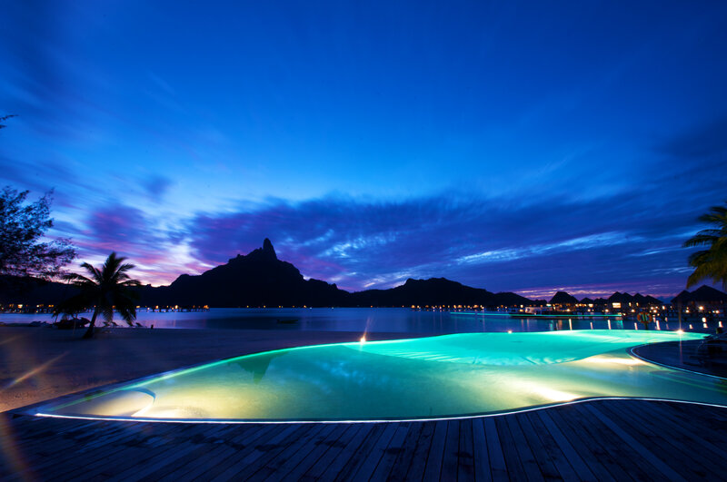 Infinity Pool at Resort — Blue, Serene, Night, Photograph, Mountain