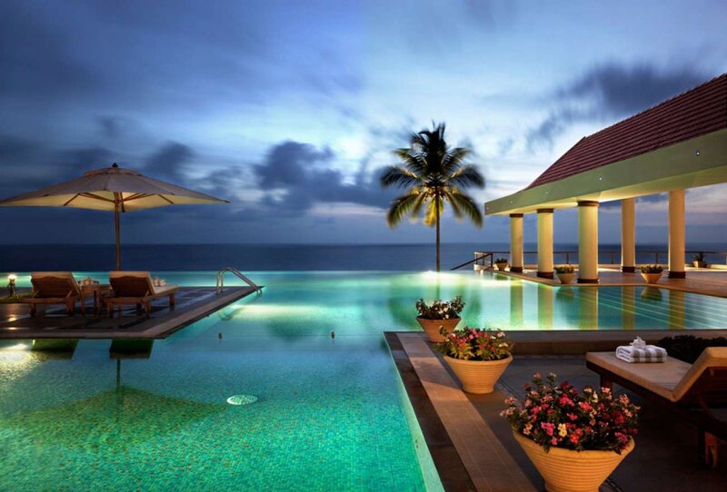 Infinity Pool at Resort — Blue, Serene, Night, Photograph, Palm Tree